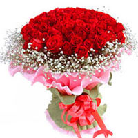 66 red roses with greens, pink and green paper wra......  to Jilin