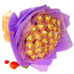 28 gold chocolates, single package. Purple gauze a......  to Nanan