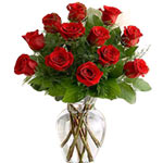 12 red roses with green stuff in a glass vase.......  to Wenshan