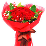  19 red carnations, with greens and babybreath and......  to Jining