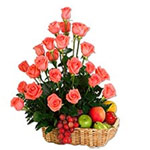A 24 Roses arrangement nicely set within a fruit b...