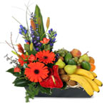 Gorgeous New Year Gift Basket of Tropical Flowers and Fresh Fruits