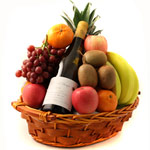 Alluring Party Wine with Fresh Fruits Basket