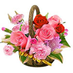 Delightful Mixed Roses and Flowers with Greens Basket