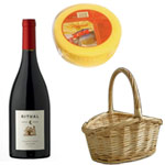  A decorated basket with 1 bottle of Wine* and a m...