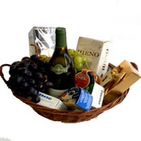 Basket includes: White wine Chablis La Serene 06, ...