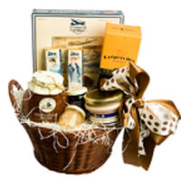 This medium-sized gift basket contains both sweet ...