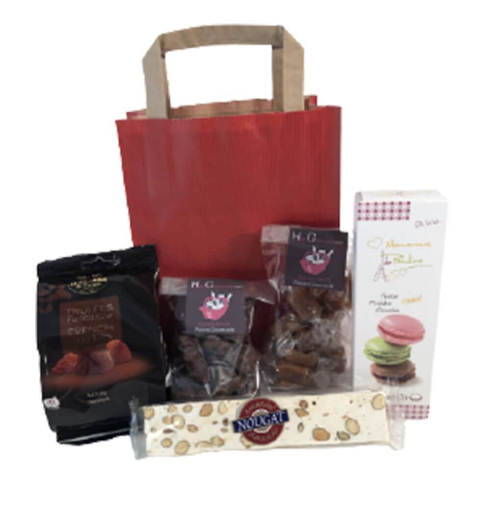 A gift bag filled with delicacies such as candy, c......  to Libourne