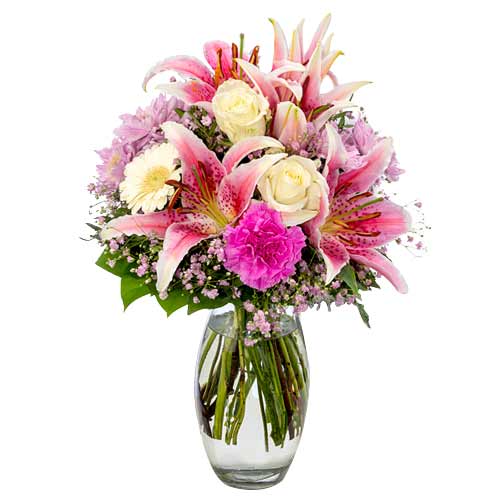 Present this Seasonal Mix Floral Bunch with Vase N...