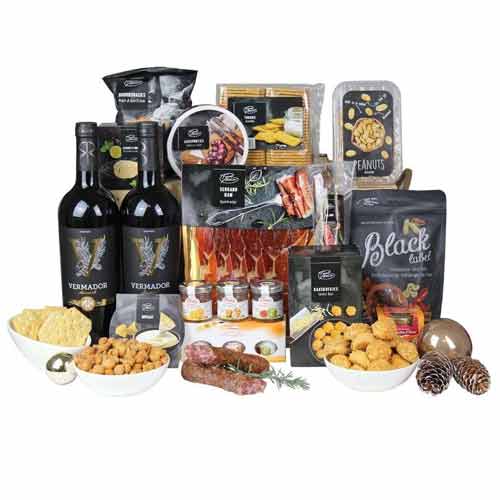 A perfect gift for any occasion, this Sweet Tooth Gourmet N Wine Gift Hamper spr...