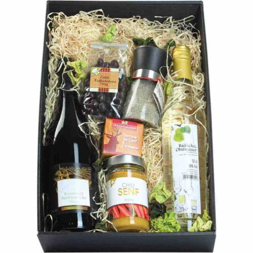 The two tasty products are packed in a sturdy beechwood box that is decorated wi...
