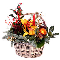 Basket of New Year candle diakosmisi.Periechi, ilex and various decorations. Sen...