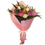 Show them you care with pink lilies and  white ros......  to Larisas