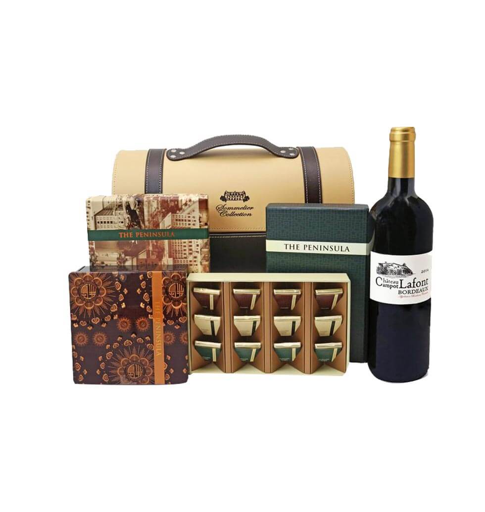 The Peninsula wine gift hamper is packed with a Ch......  to Wu Kau Tang
