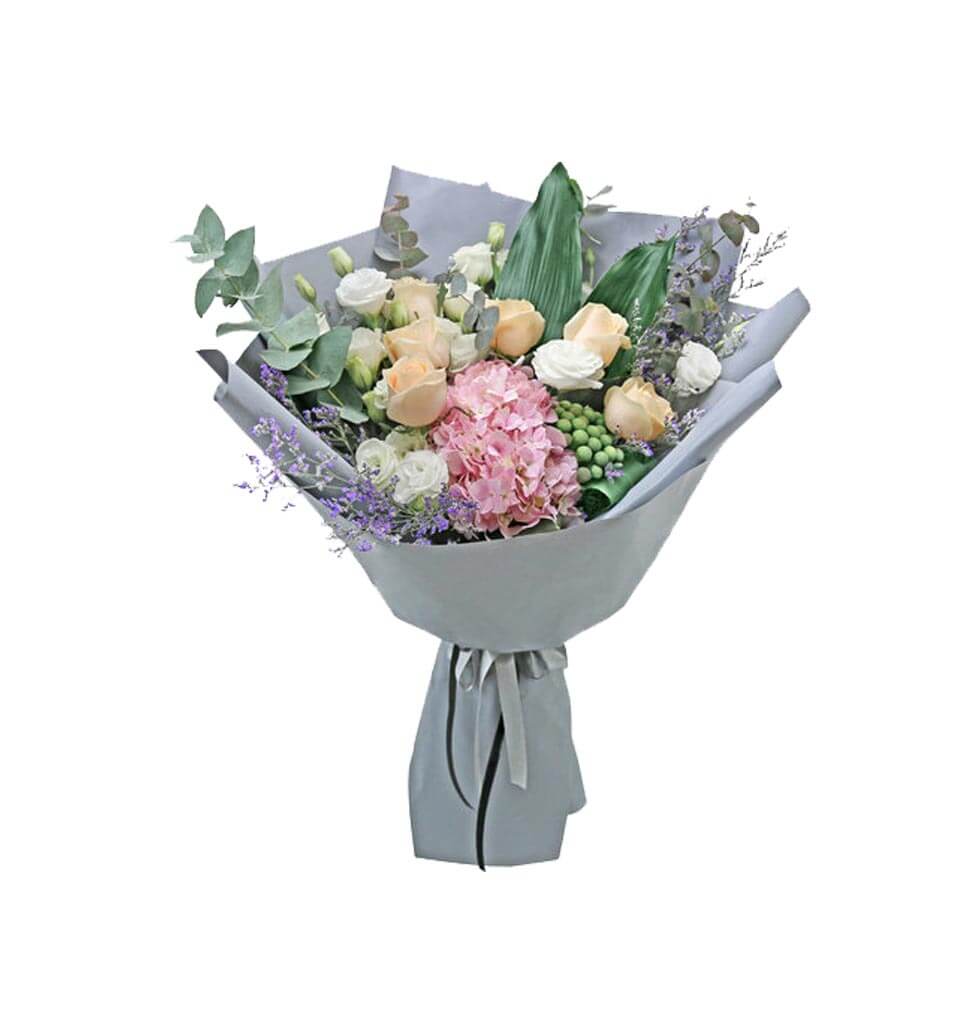 The Avalanche Rose Bouquet is a vibrant mix of red Eustoma roses and white Hydra...