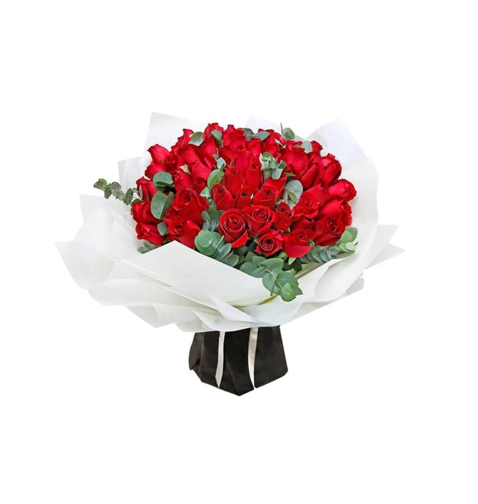 99 red roses in a beautiful bouquet.