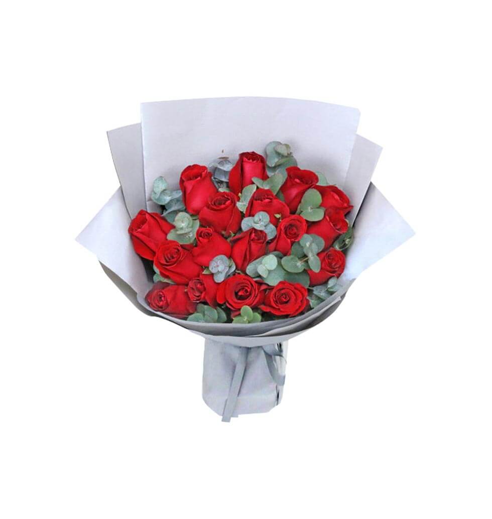 A beautiful flower bouquet of Red rose 18pcs. matching greens not only makes you...