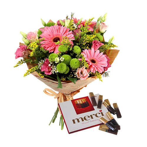 Expressive Love Treat Seasonal Mixed Flower Bouquet with Merci Chocolates