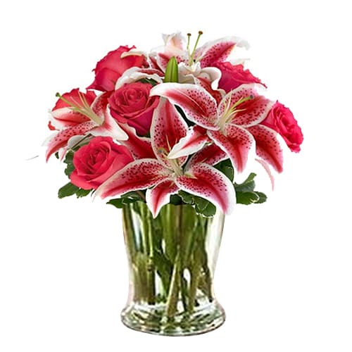 Cheerful Arrangement of 3 Pink Lilies and 5 Red Roses with Vase