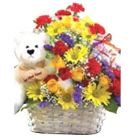 Flower basket with teddy bear