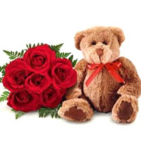 This sweet looking bear with 6 roses will tell your special one about yur feelin...