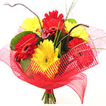 Pink n Yellow combination of Gerbera, Carnations n other seasonal flowers is sur...