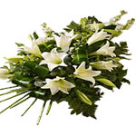 A brilliant display of creamy white flowers to send your condolences. This arran...
