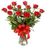 Exotic bouquet of beautiful red roses accompanied ...