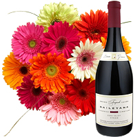 Magical 12 Gerberas Bouquet with A Bottle of Wine