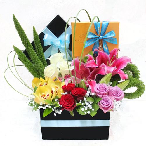 Vibrant Floral Arrangement with Godiva Chocolates