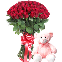 Eternal Flame of Beautifully Arranged Freshest Flowers along with a Teddy
