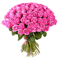 Bright 50 Long Stemmed Pink Roses Arranged in an Exclusive Bouquet