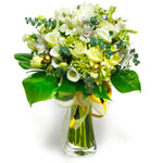 A round bouquet in white, made with tulips, roses ...