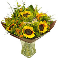 Country Girl is   a sunny bouquet made with 7 Sunf...