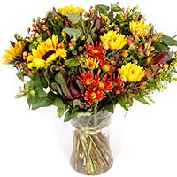 Country Bouquet warm colors, made with sunflowers, daisies, Aifricom, and  Sulid...