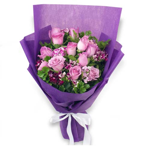 Immerse your loved ones in the happiness this Blooming Collection of 12 Purple R...