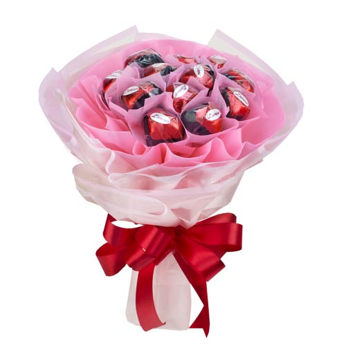 Present to your beloved this Tasty Collection of Heart Shaped Chocolate Bouquet ...