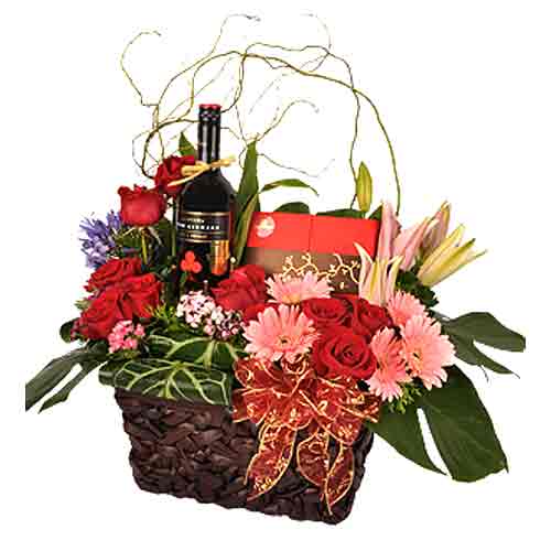 Excellent White Wine N Flower Assortments in a Gift Basket