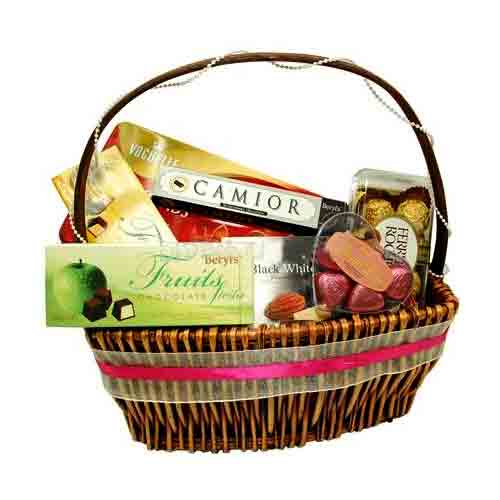 This basket includes:- Beryls Chocolate & Ferrero Rocher(16pcs) Chocolate In a B...