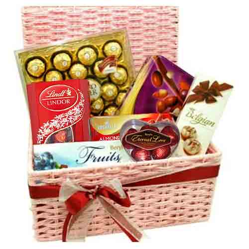 This basket includes:- Lindt Lindor, Vochelle Milk Chocolate(205g), Beryls Fruit...