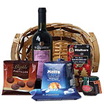 Present this Premier Basket of Sweet Treats for Th...
