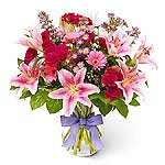 A beautiful bouquet in pink, reds and blues, suitable for every occcasion....
