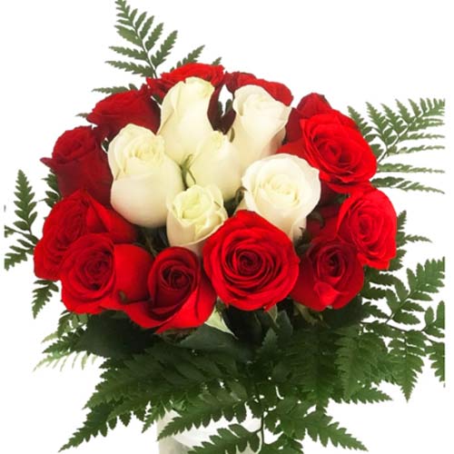 Present to your beloved this Sensational Composition of Roses in White N Red Col...