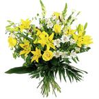 Long stemmed bouquet of mostly yellow and orange flowers....