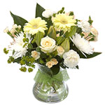 Send this arrangement of white roses, gerberas and...