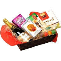Welcoming Finest Candy N Champagne Gift Basket