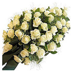 Classic Rest Well Now Drop-Shaped Arrangement of White Roses