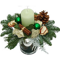 Christmas arrangement in glass vase silver green