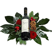 Bottle of wine for New Year red is a red wine made with red flowers on a scale w...