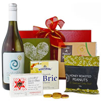 Captivating Wine N Assortments Gift Hamper